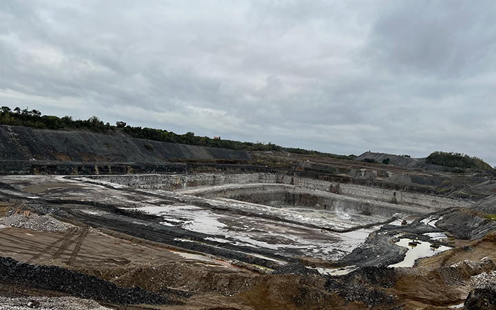 Earthmoving equipment performing site work